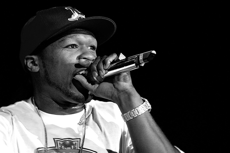 Rapper 50 Cent in concert sporting Bling-Bling