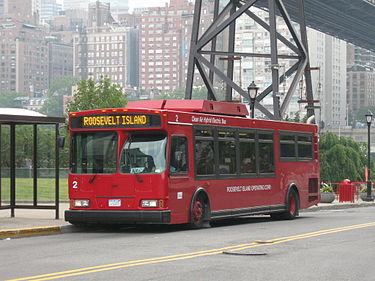Roosevelt Island Red bus #2 sits at the Roosevelt Island Tramway terminal on Roosevelt Island