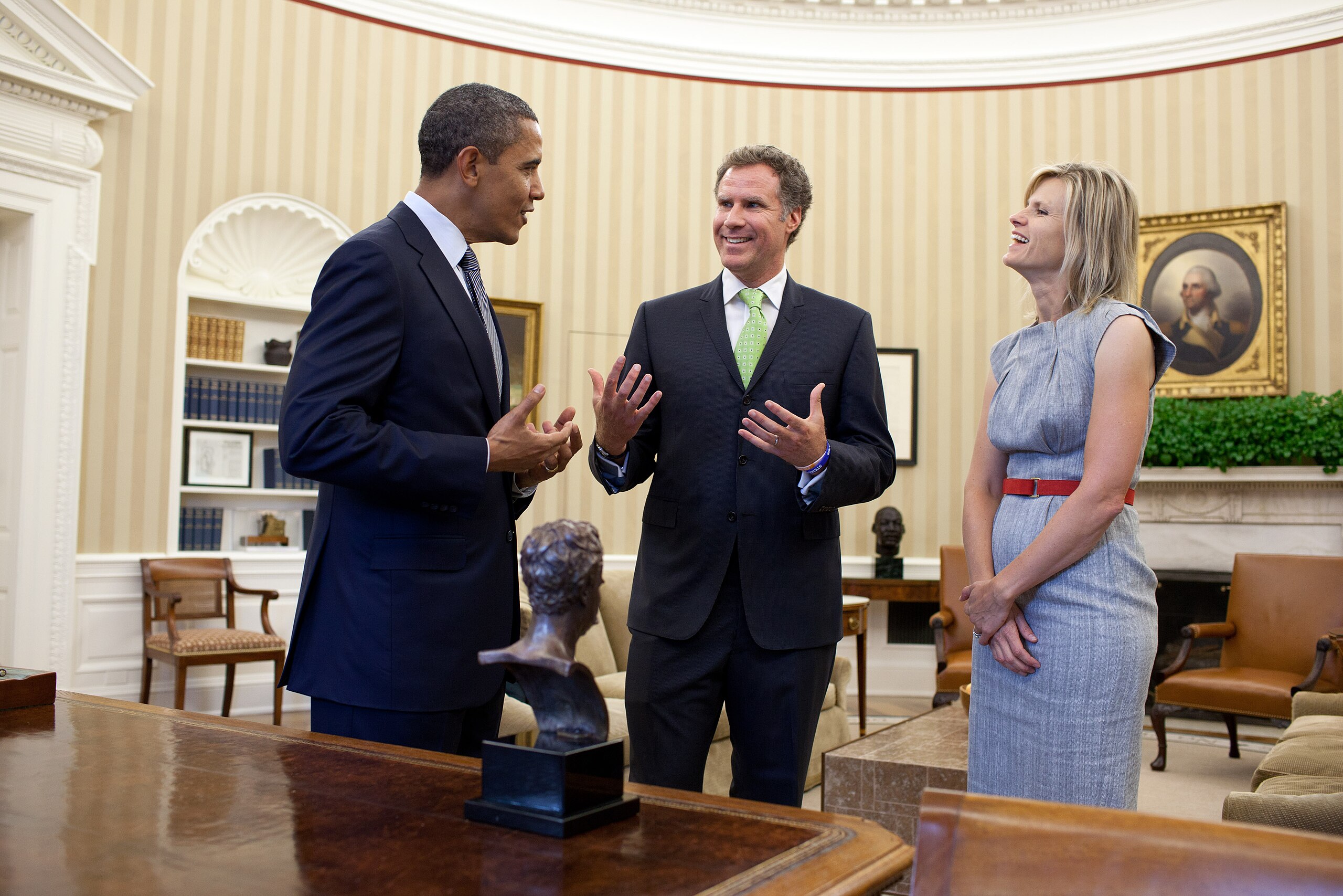 President Barack Obama congratulates Will Ferrell for recently winning the Mark Twain Prize for American Humor during an Oval Office drop-by, Oct. 21, 2011. Ferrell's wife, Viveca Paulin, right. (Official White House Photo by Pete Souza)