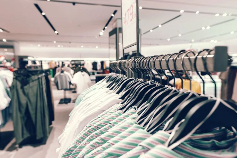 A Close-up Picture of Hanging Clothes Featured for Sale in Store.