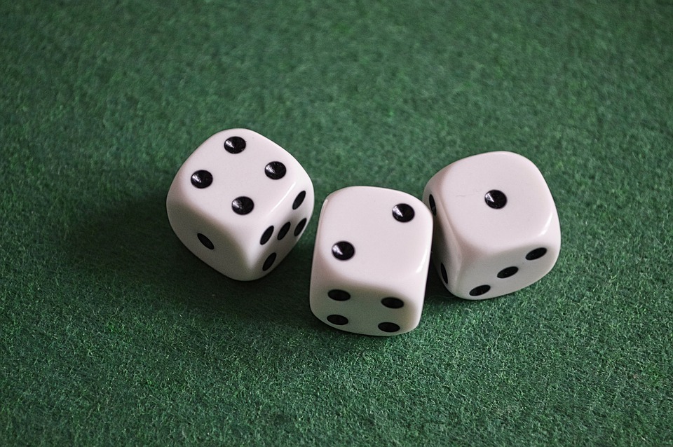 dice on a green table