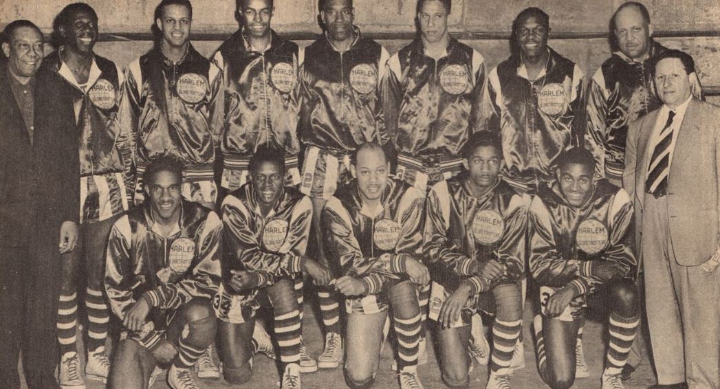 1950 World Series Harlem Globetrotters with owner Abe Saperstein (right) and team secretary W. S. Welch (left)