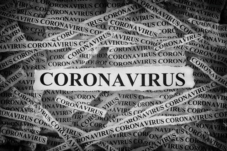 Strips of newspaper with the word Coronavirus typed on them