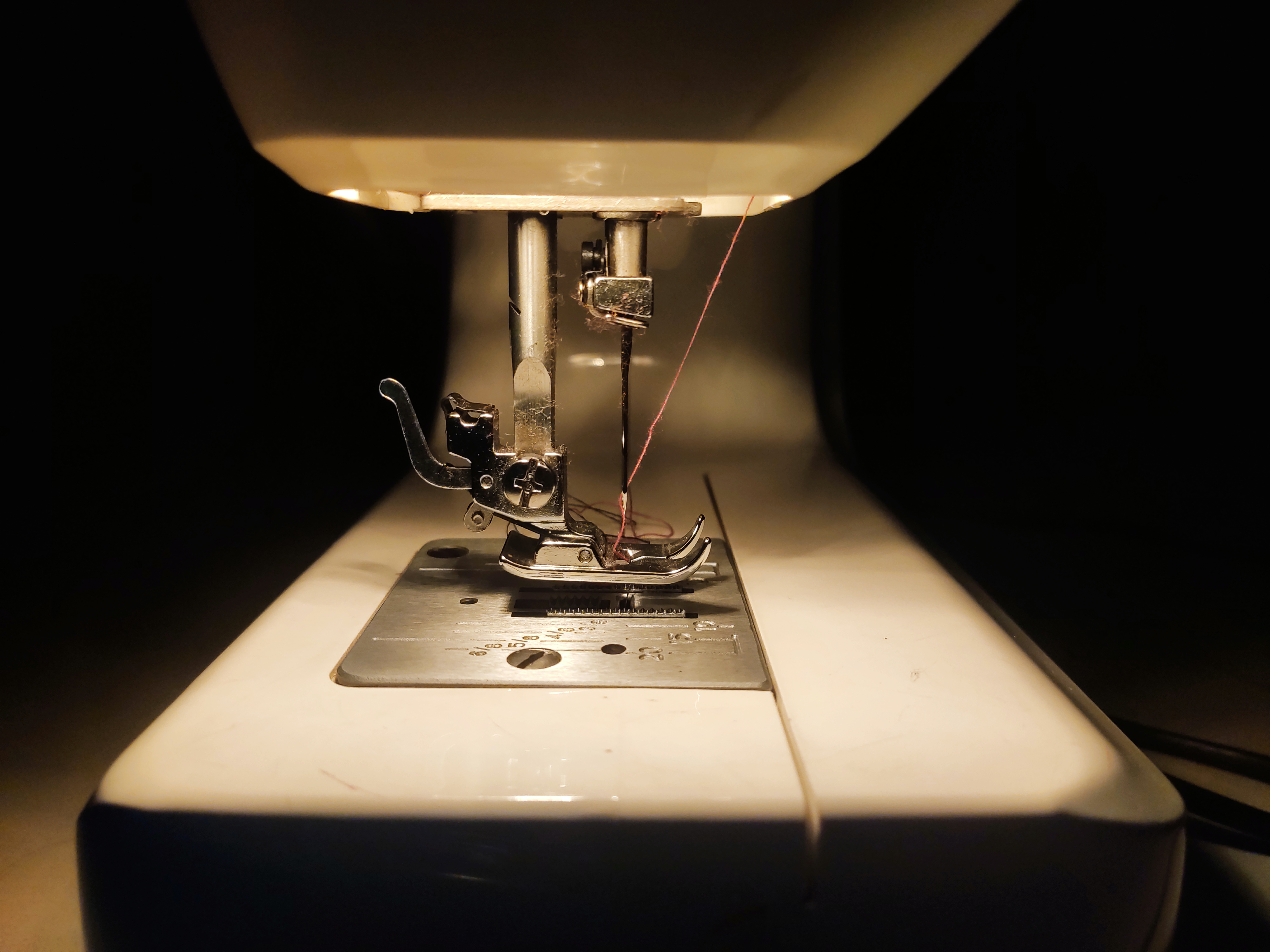 a-close-up-of-an-industrial-sewing-machine