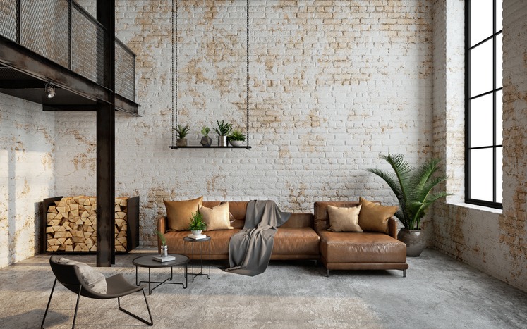 Industrial loft living room interior with sofa,chair and brick wall
