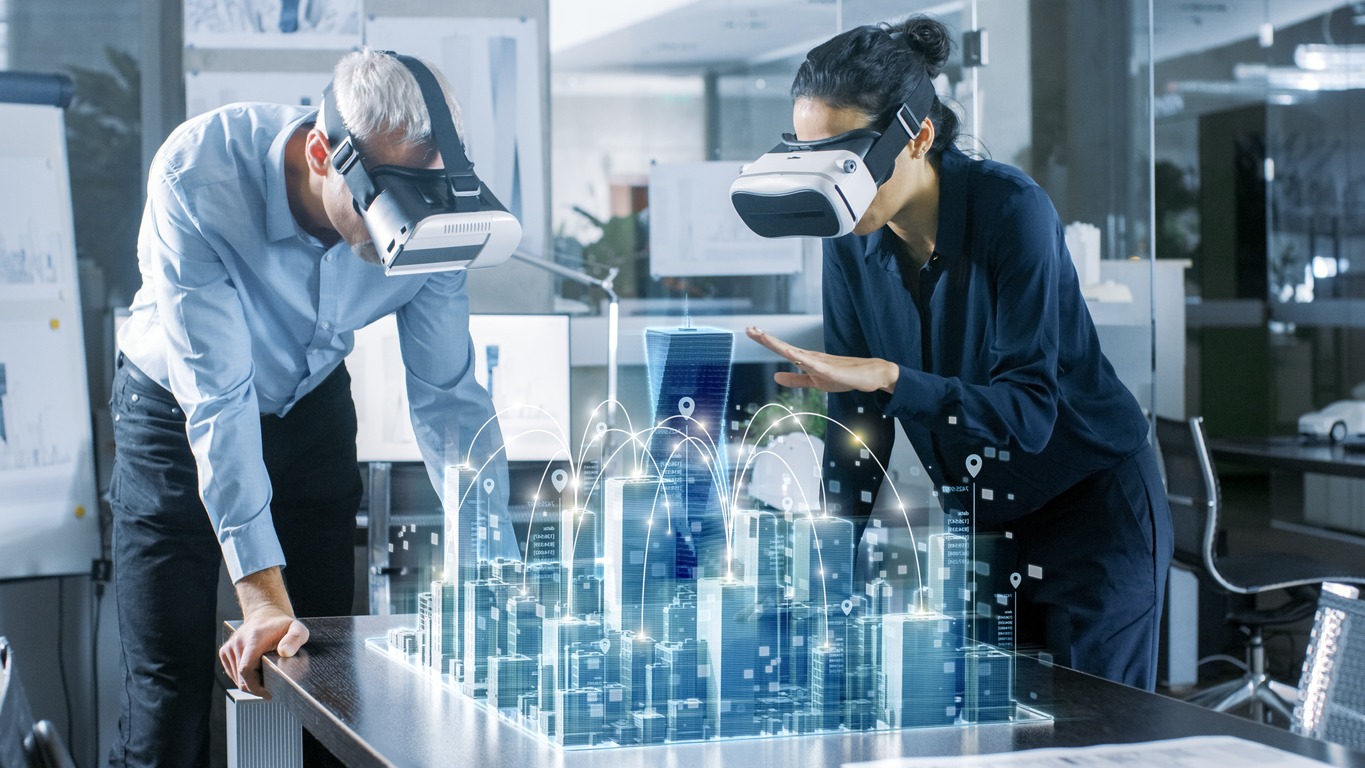 Male and Female Architects Wearing Augmented Reality Headsets Work with 3D City Model