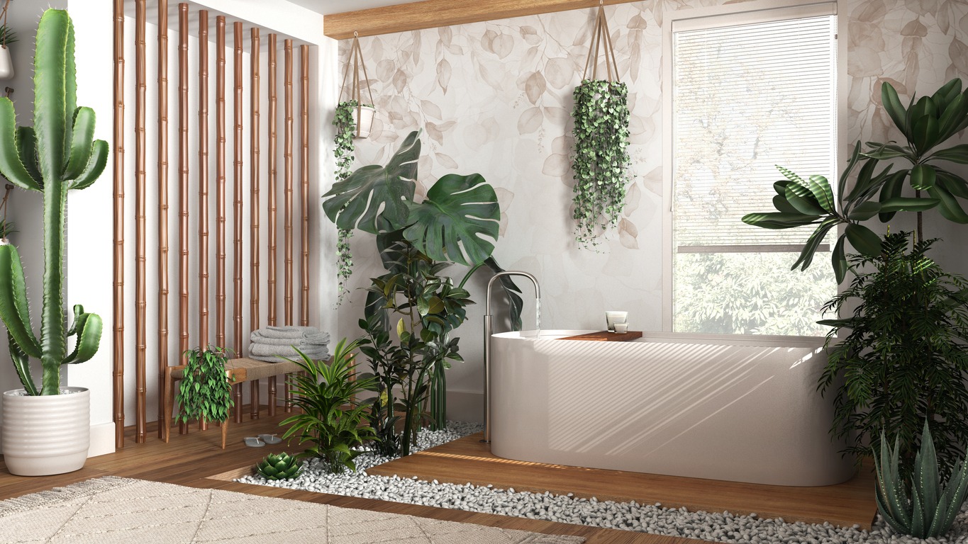 Modern wooden bathroom in white and beige tones with freestanding bathtub and bamboo wall