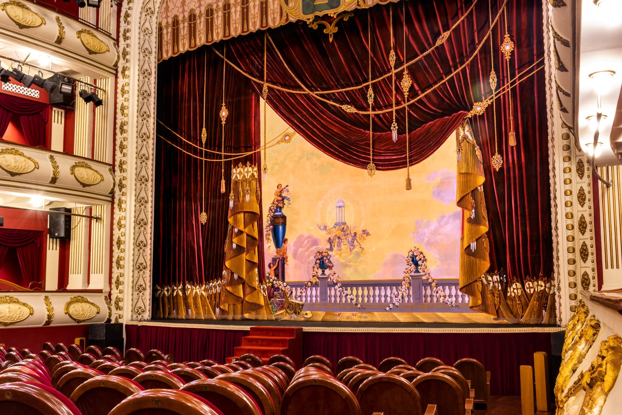 an opera’s stage with drapes