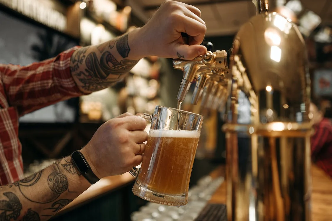 bartender pouring beer