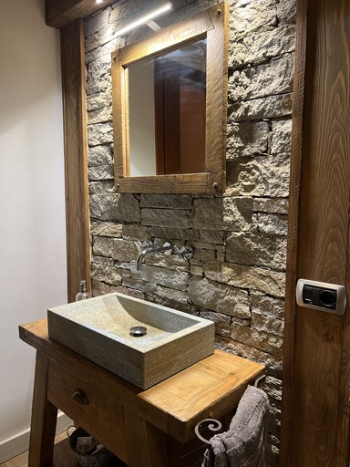 rustic mountain furniture in stone and larch wood