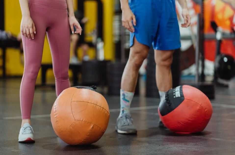 Close-up of People with Fitness Balls in Gym