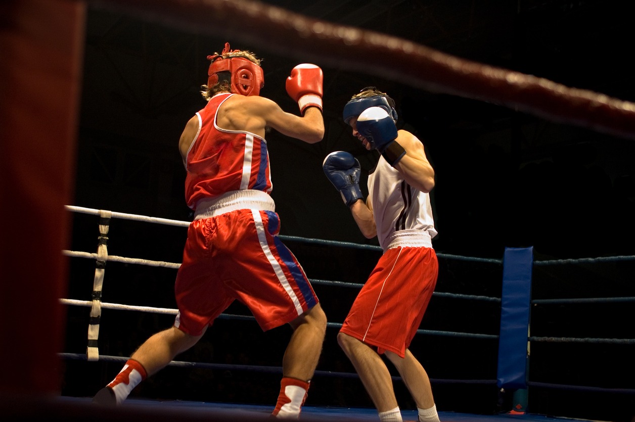 Two people boxing