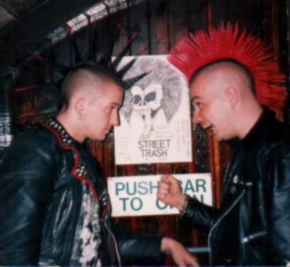 Two people posing for Punk Rock