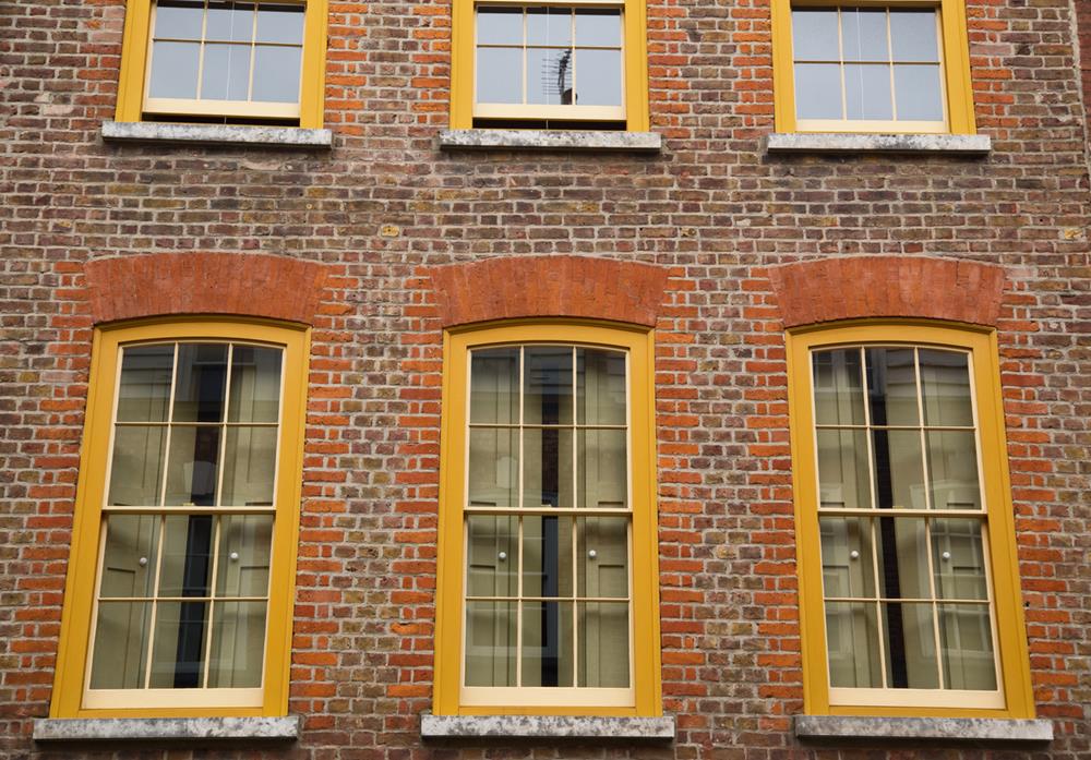 Glass windows with yellow lining