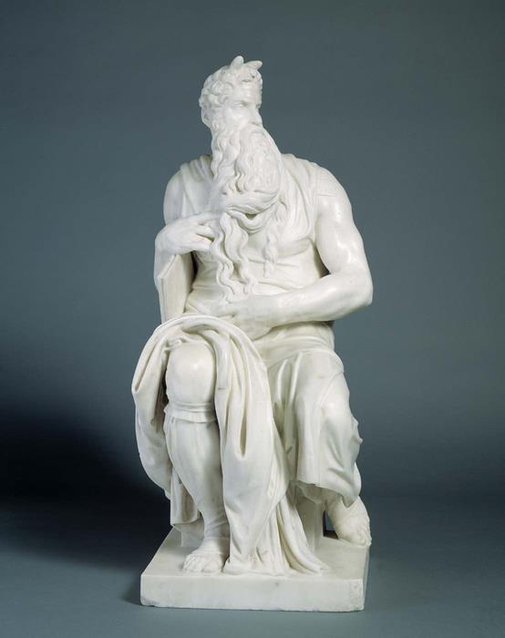 Statue of a bearded man sitting