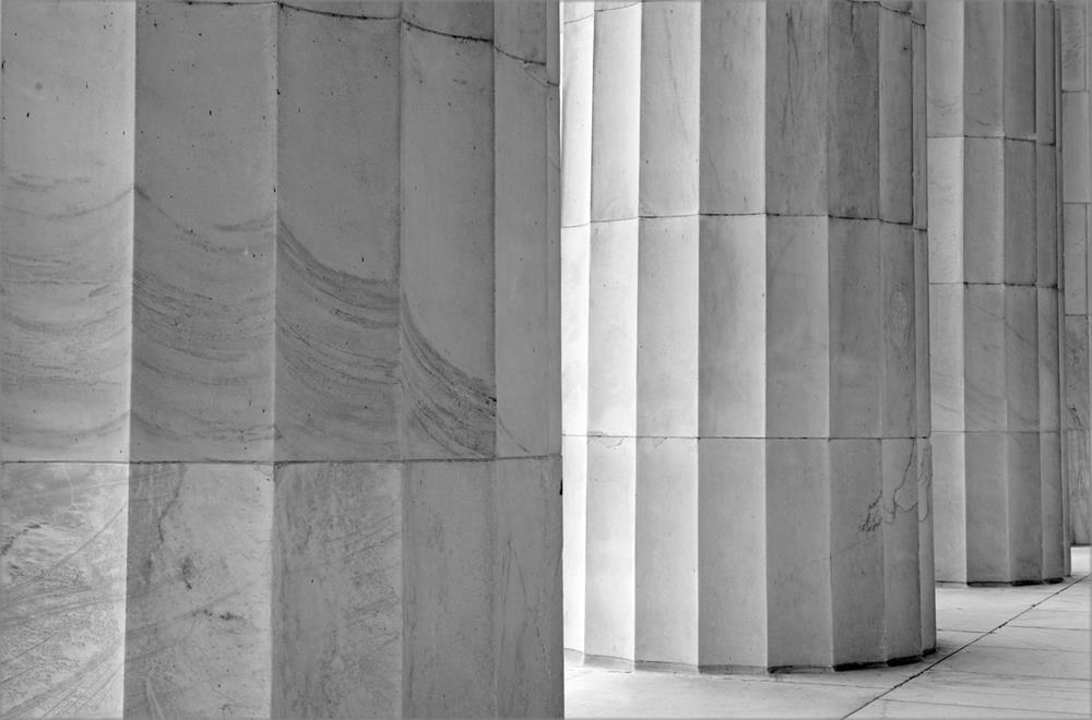 White marble fluted columns closeup